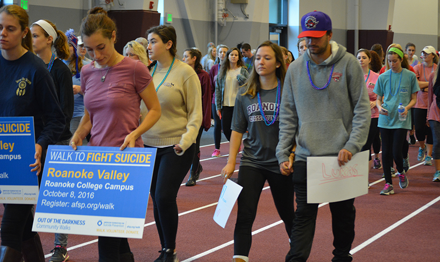 Students participating in the out of the darkness walk