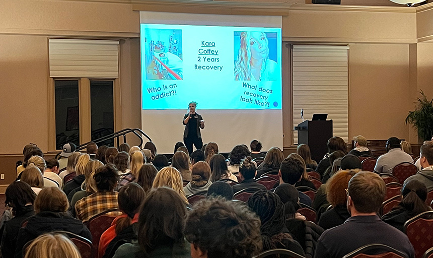 Peer recovery specialist Kara Coffey with the Bradley Free Clinic’s HOPE Initiative addresses the room during the Dec. 1 training event.