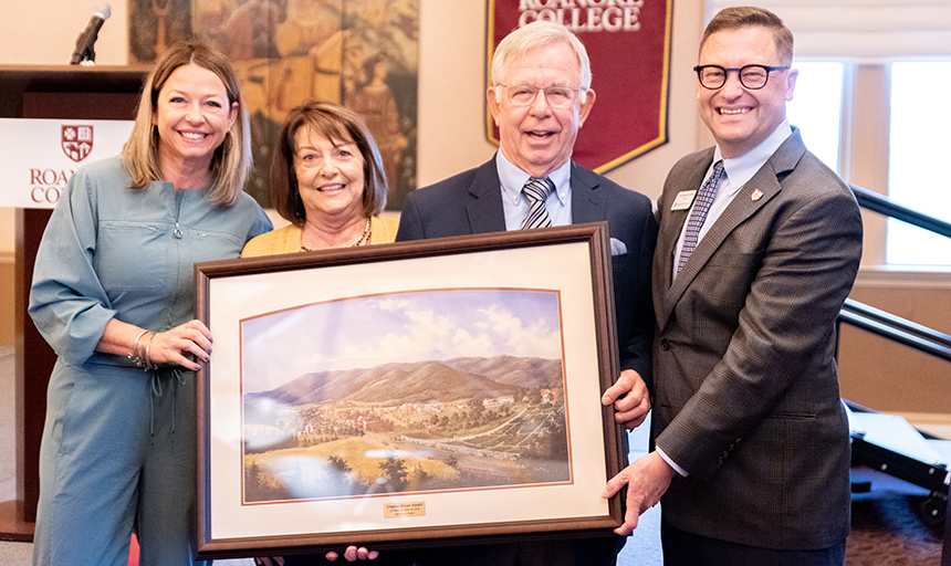 Tommy Barber with his family and President Frank Shushok