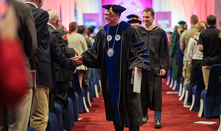 President Frank Shushok Jr. leads the recessional followed by Malon Courts '92, chairman of the Roanoke College Board of Trustees.