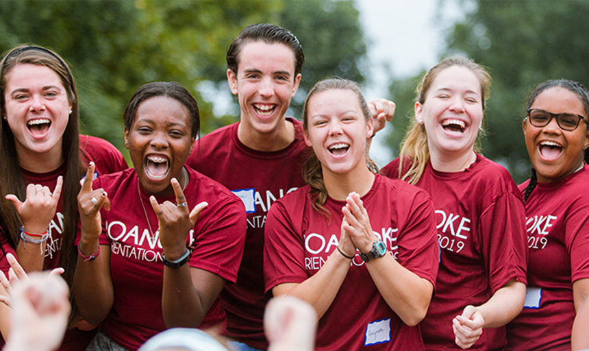 Students laugh and cheer during a prior year's welcome event