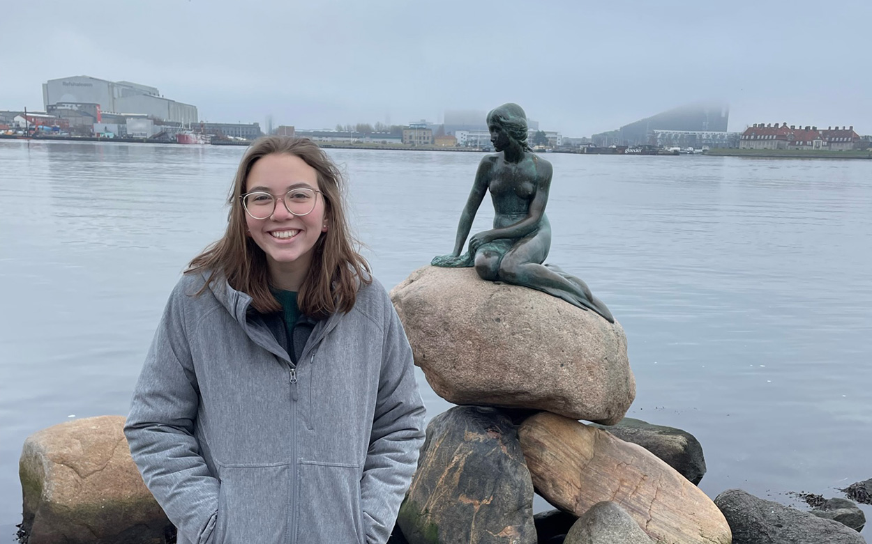 Becca Moorman pictured with a statue