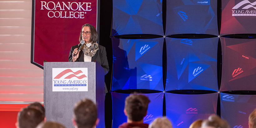 Kathy Wolfe welcomes audience at Yeonmi Park event