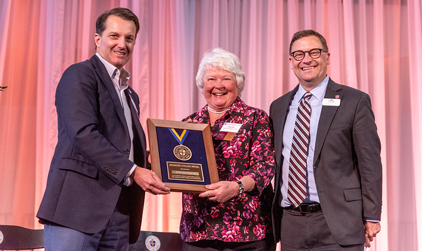 Sandra (Nelson) Bates ’69 (center) receives the Roanoke College Medal from (left) Malon Courts, chair of the board of trustees, and (right) President Frank Shushok Jr. during the Society of 1842 luncheon on Alumni Weekend. 