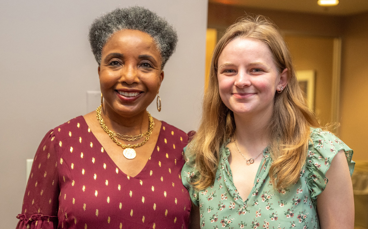 Carol Swain and Bryana Archer smile for a photo