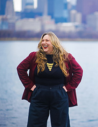 Dessa Gypalo laughing along the riverfront in Chicago