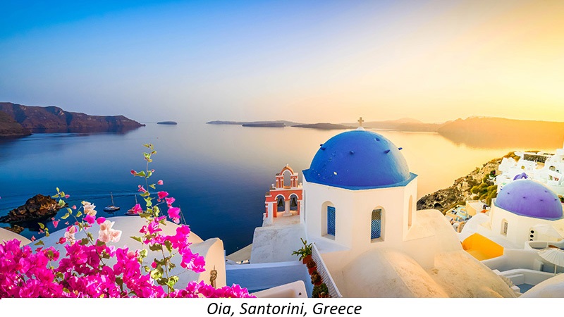 A view of the sunset over the waters of Santorini, Greece