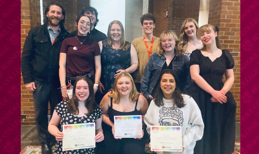 Students and faculty smiling for a photo