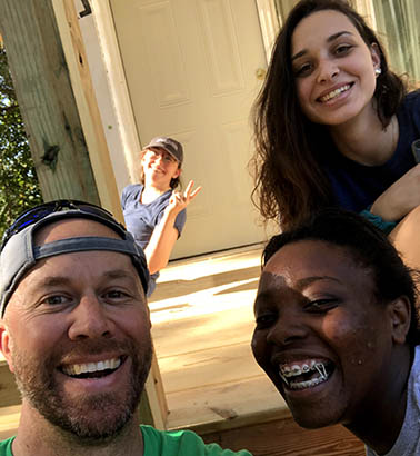 Chaplain Chris Bowen takes a selfie with some of the students