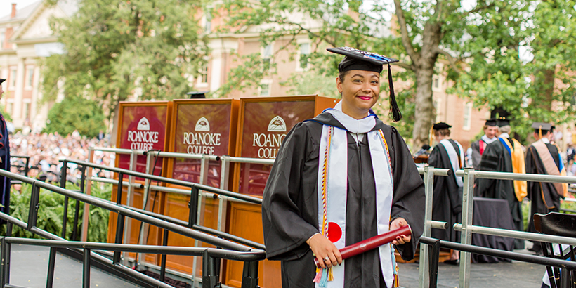 Anna Ford walks down the ramp with her degree