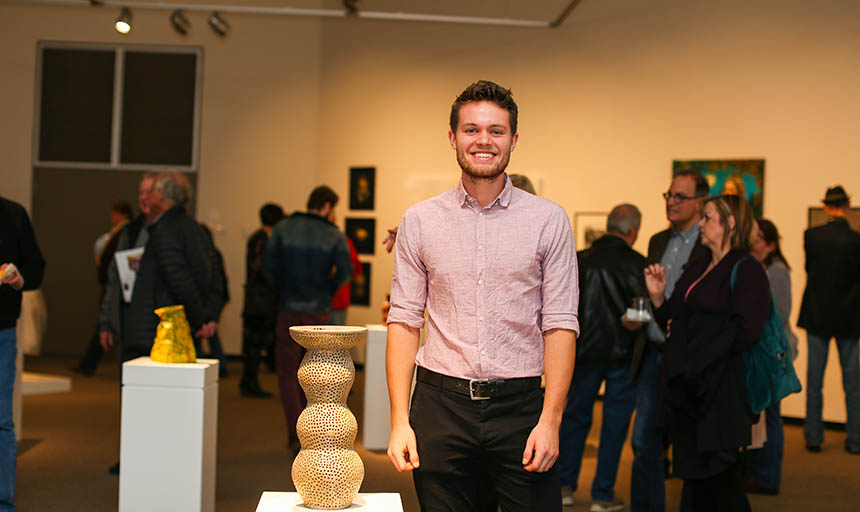 Isaac Davis '19 with his exhibition entry.
