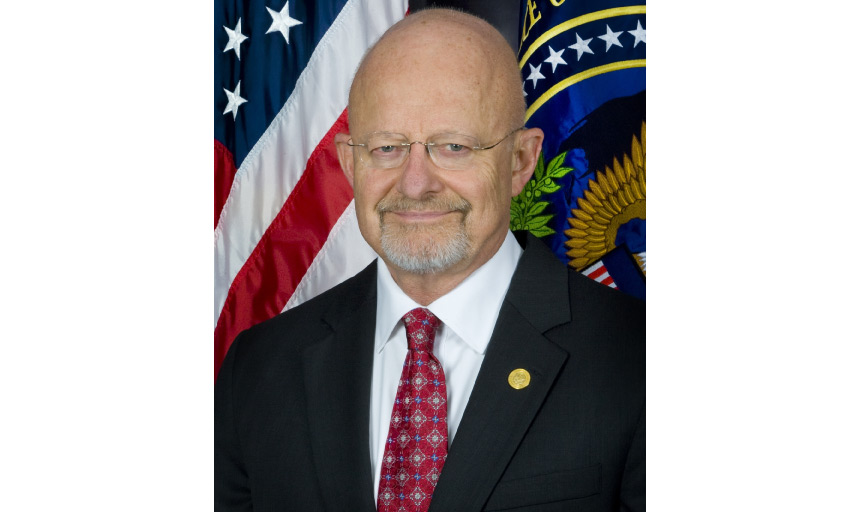 Lt. General James Clapper in front of flags