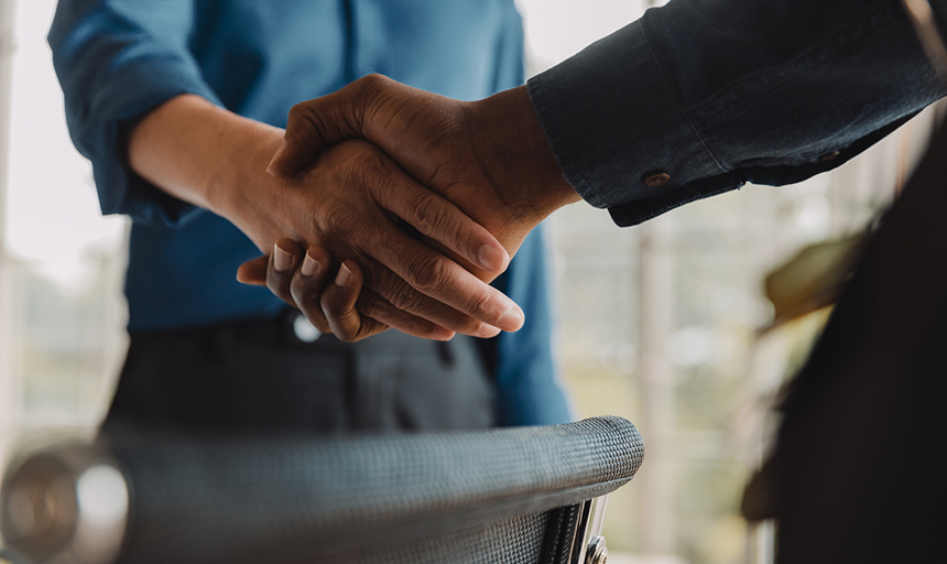 two people shaking hands