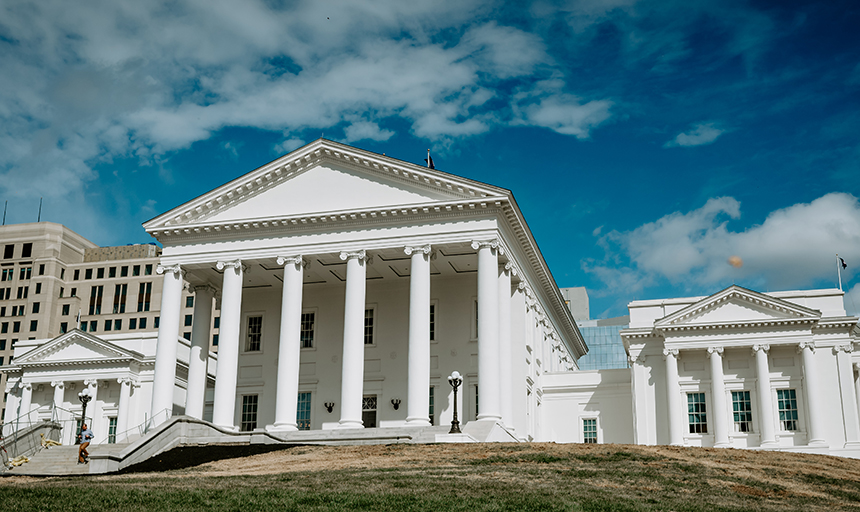 Virginia Capitol building with a blue sky and white clouds