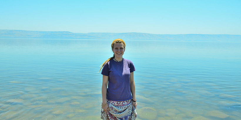Student in front of the Sea of Galilee