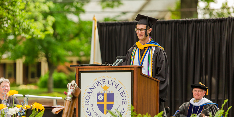 Liam Lambert giving a speech as co-valedictorian