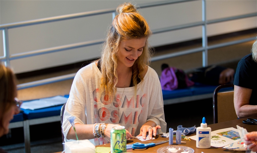 sydney brown working on paper blooms