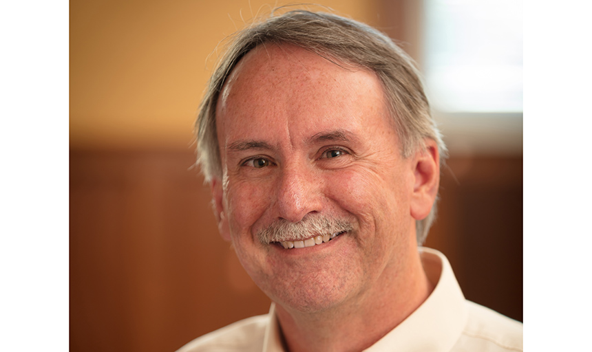 Dr. Roland Minton smiles for a photo