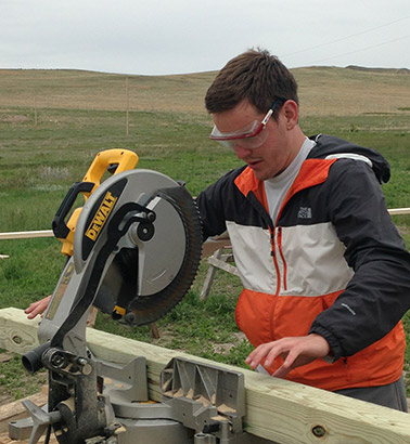 Student using a power saw