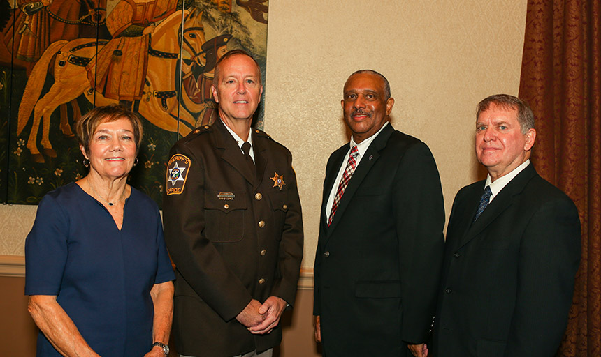 2017 Charles Brown Award recipients, from left to right, Diane Washenberger, director of instruction for Salem City Schools; Salem Sheriff Eric “Ric” Atkins; former Salem City Manager Forest Jones; and David Turk, teacher and coach.