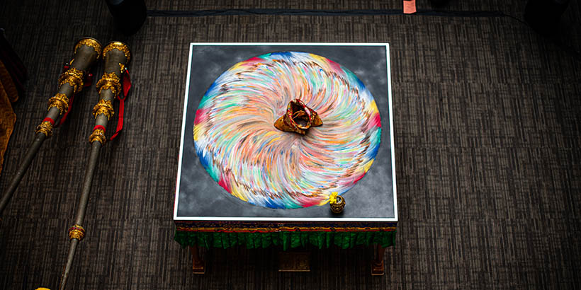 The sand mandala swept into the center as part of the closing ceremonies