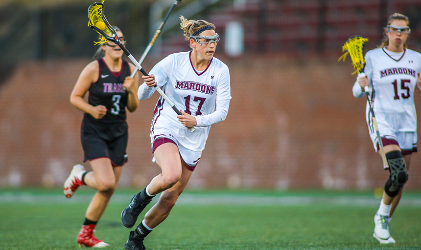 Woman playing lacrosse