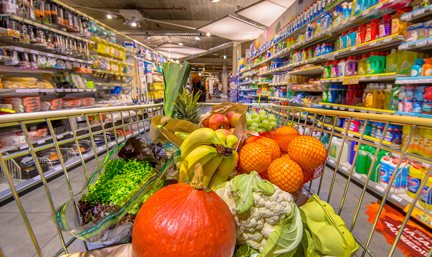 grocery cart and grocery store aisle