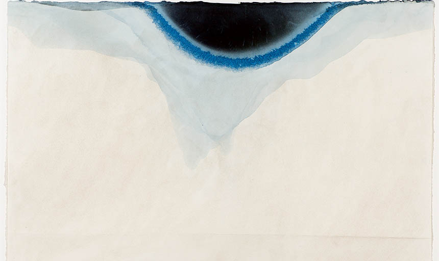 a white painting with a black hump and a blue ring around it