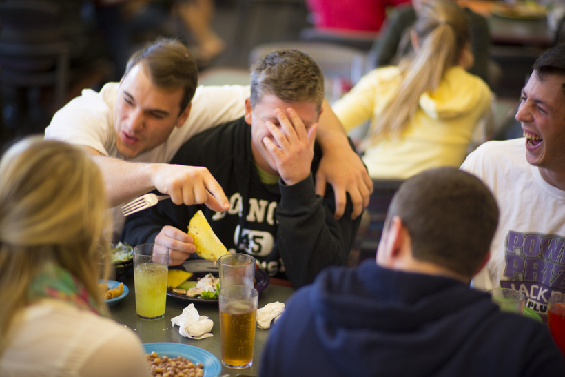 Students talking and eating in The Commons