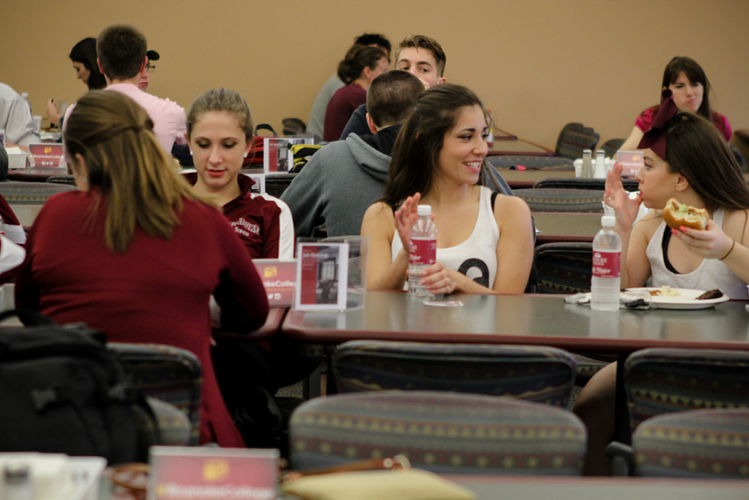 Students talking and eating in The Commons