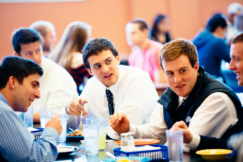 Students talking and eating in The Commons