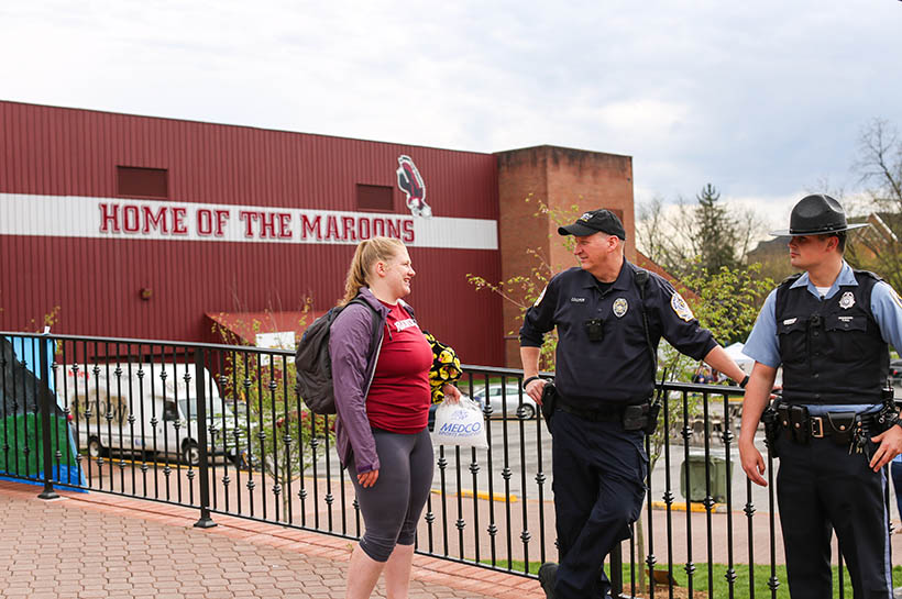 A student chatting with campus safety