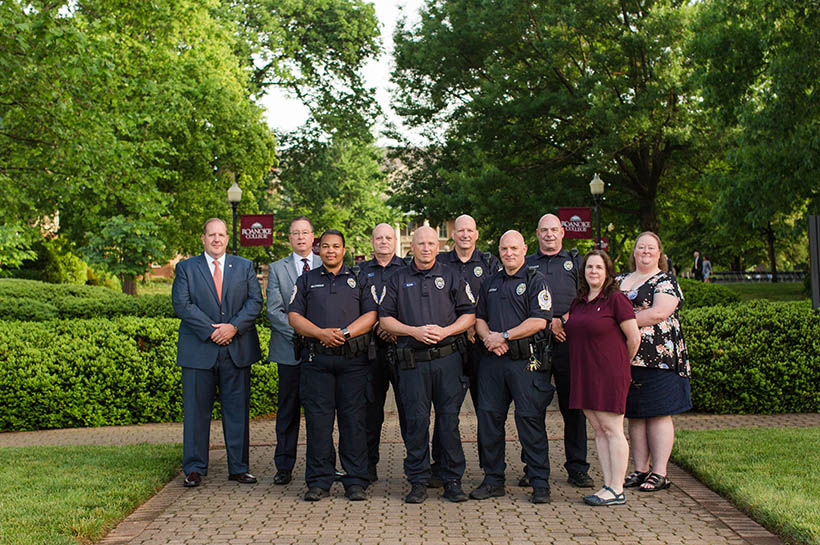 Campus Safety posing on the front quad