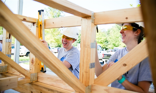 students building habitat house