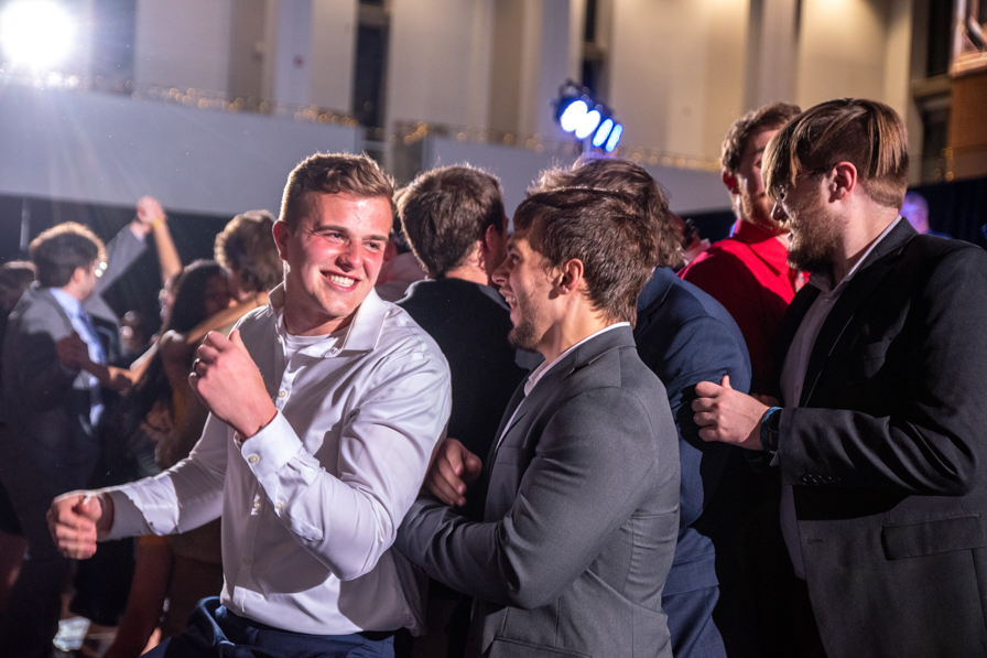 Students smiling and dancing