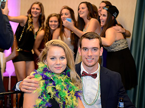 Students having fun and posing for pictures at The President's Ball