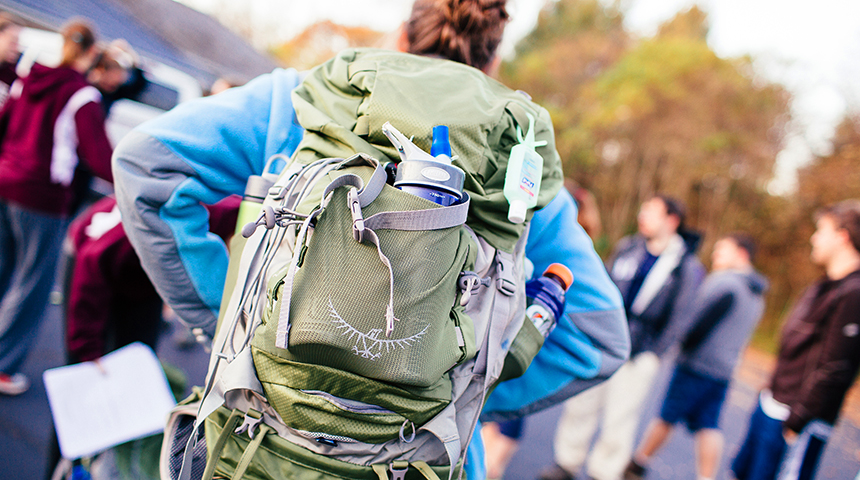 student with a backpack on