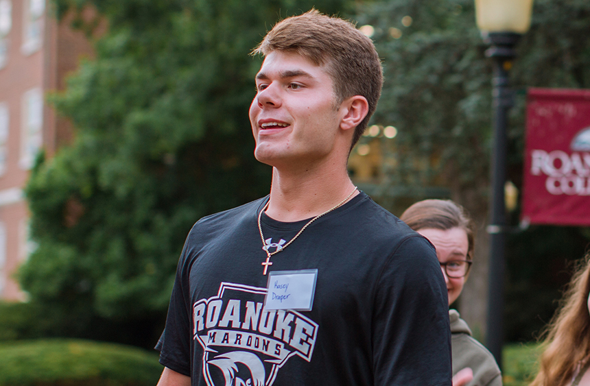 Young man with Roanoke Maroons shirt, nametag that says Kasey Draper