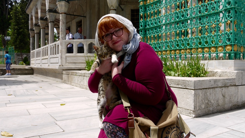 Roanoke student holding a cat