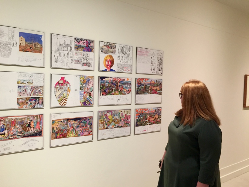 Women looks at Turkish art