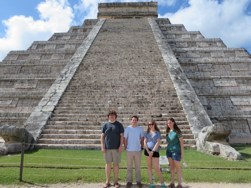 Students in front of a huge temple in the Yucatan