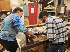 Students working backstage