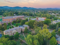 Admin building with three student walking