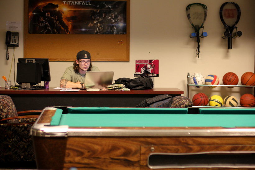 Student working in the game room