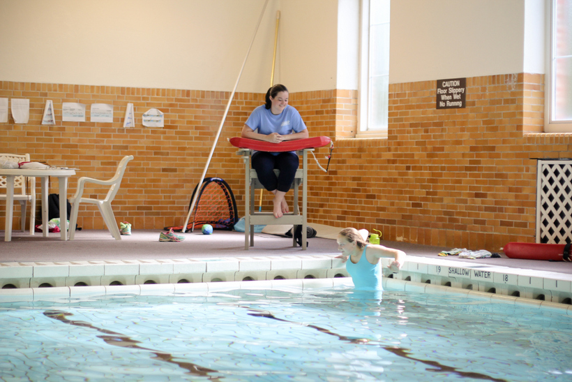 Student working in the swimming pool