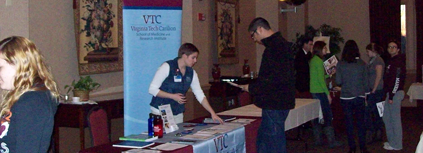 Students check out booths at a careers fair