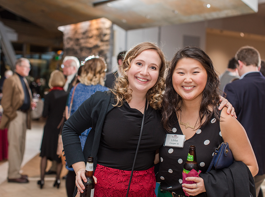 Two alumnae at an event