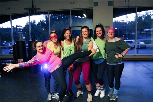 Group Fitness class with 80s theme