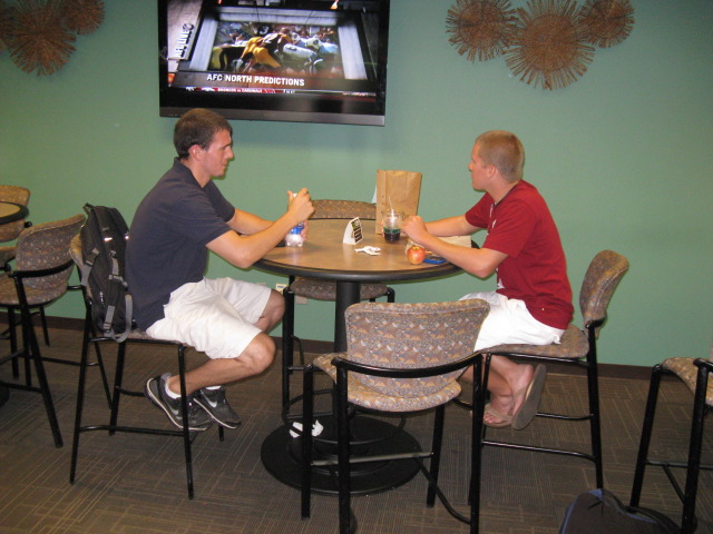 students eating in the cavern