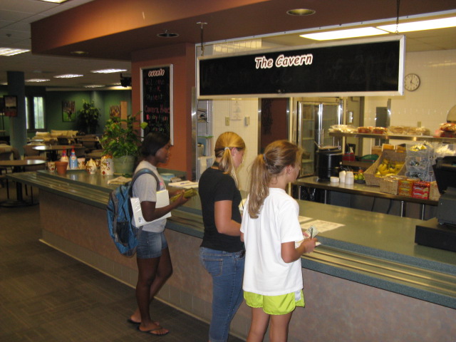 students ordering at the cavern